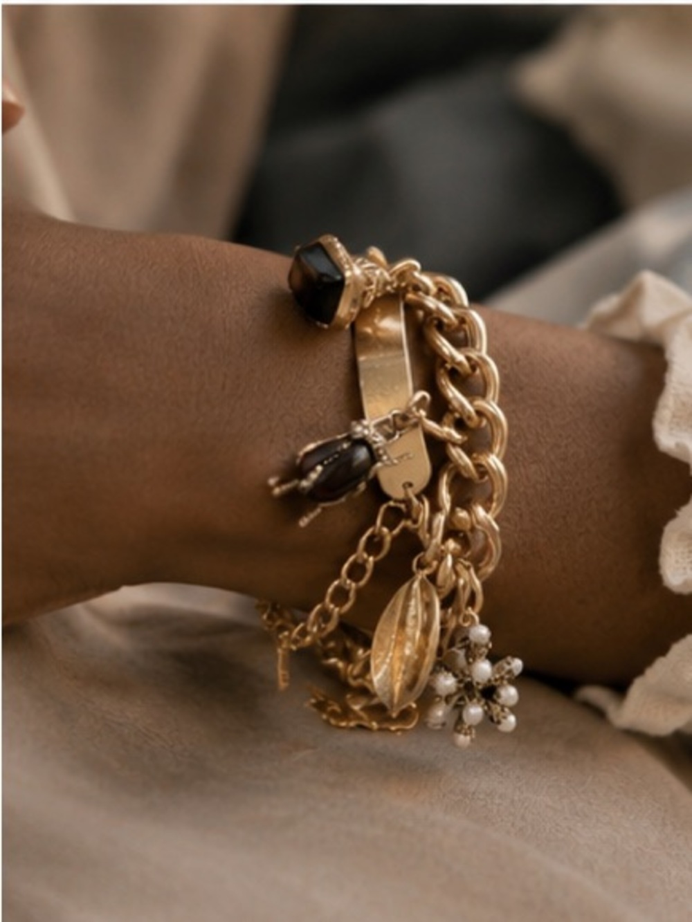 Curated Luxe Charm Bracelet with Sculptural Gold Accents